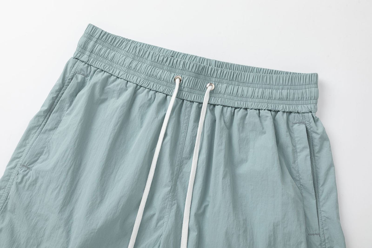 AMIRI Starburst logo shell swim shorts