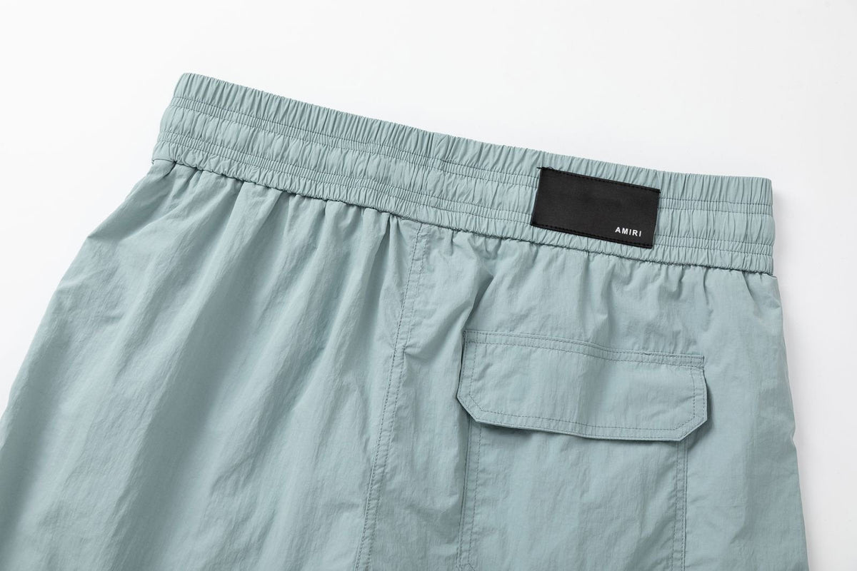 AMIRI Starburst logo shell swim shorts