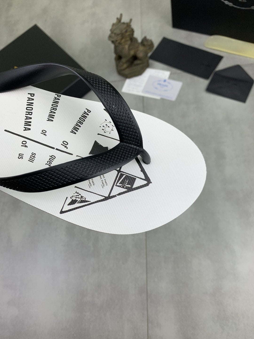 Prada Black Strap White Flip Flops